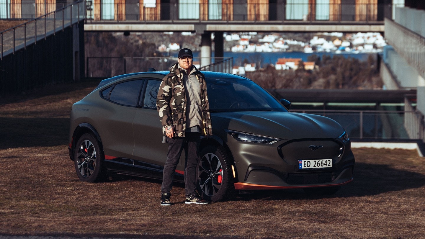 Man in front of Ford Mustang Mach-E