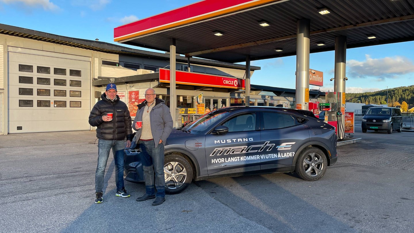 Ford Mustang Mach-E is standing at a gas station