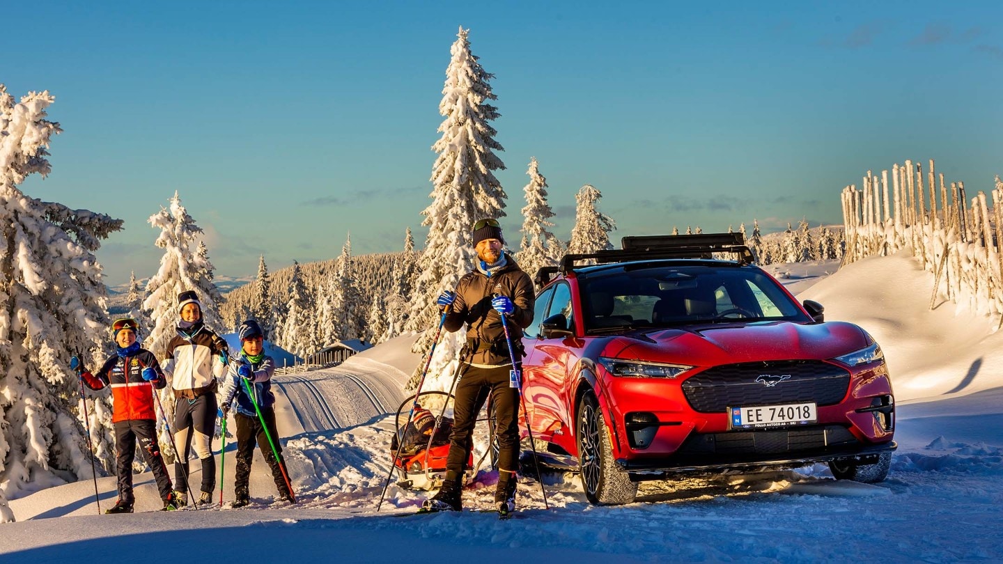 Family skiing with Mustang Mach-E