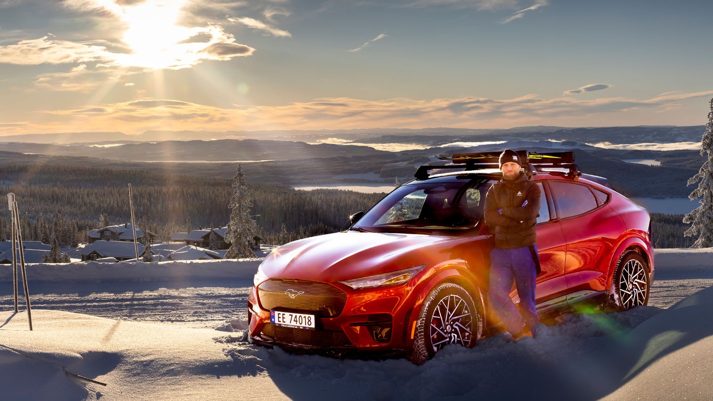 Mustang Mach-e with man in snow