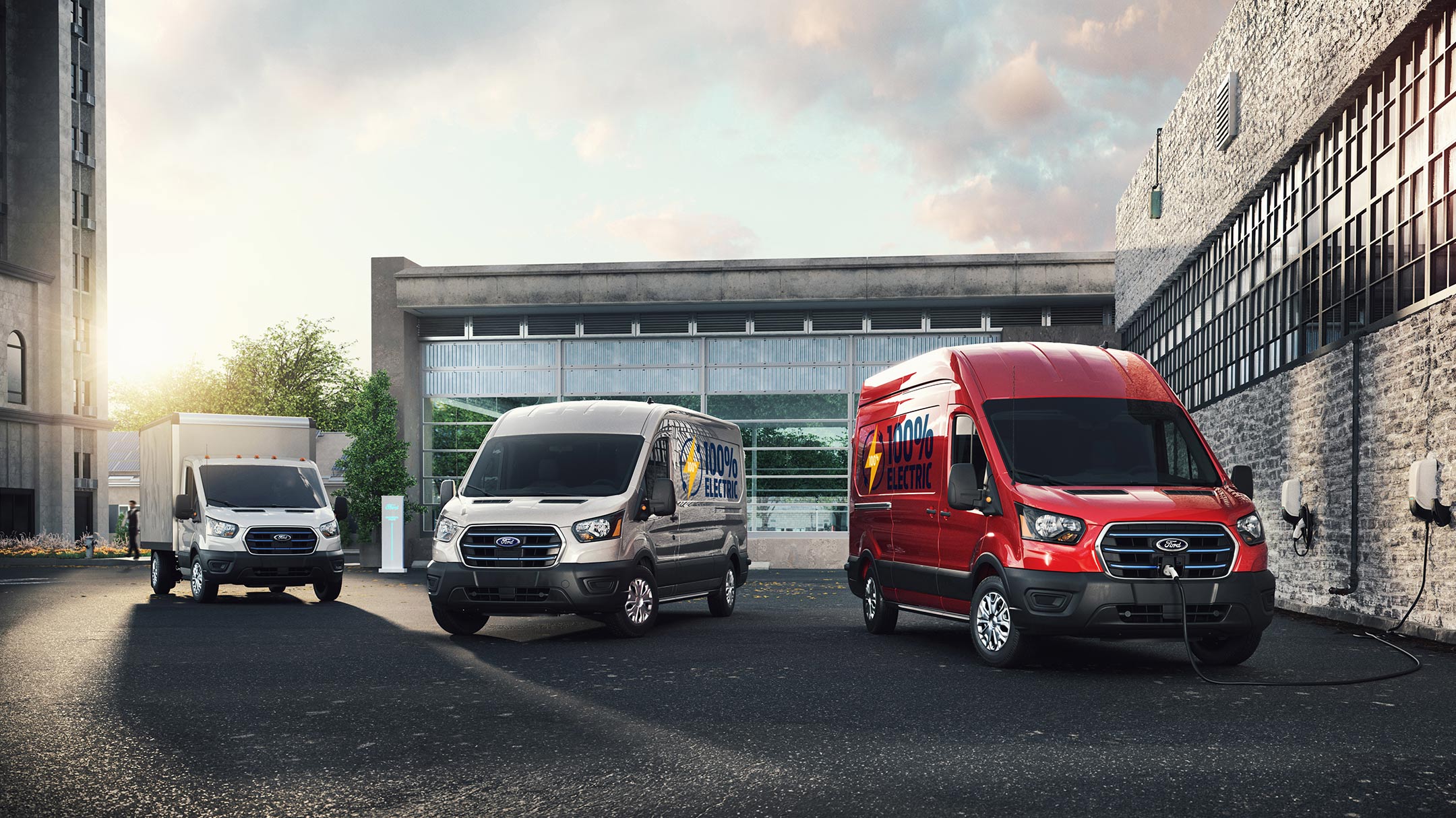 Three Ford Transit with Industrial Background