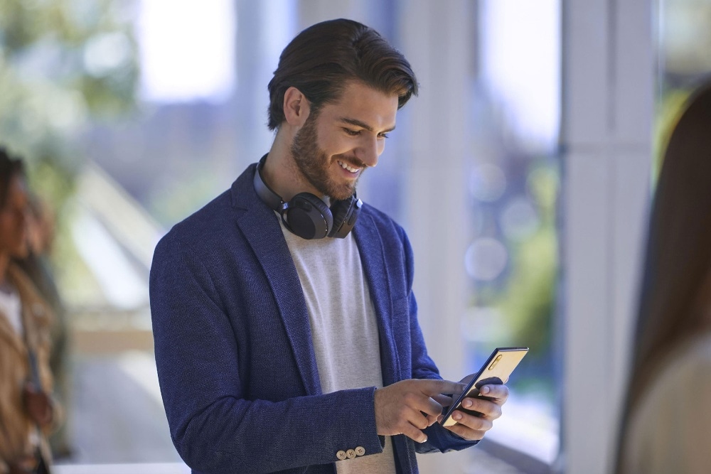 Person holding mobile phone