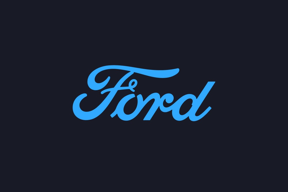 Blå Ford-logo på mørk bakgrunn.