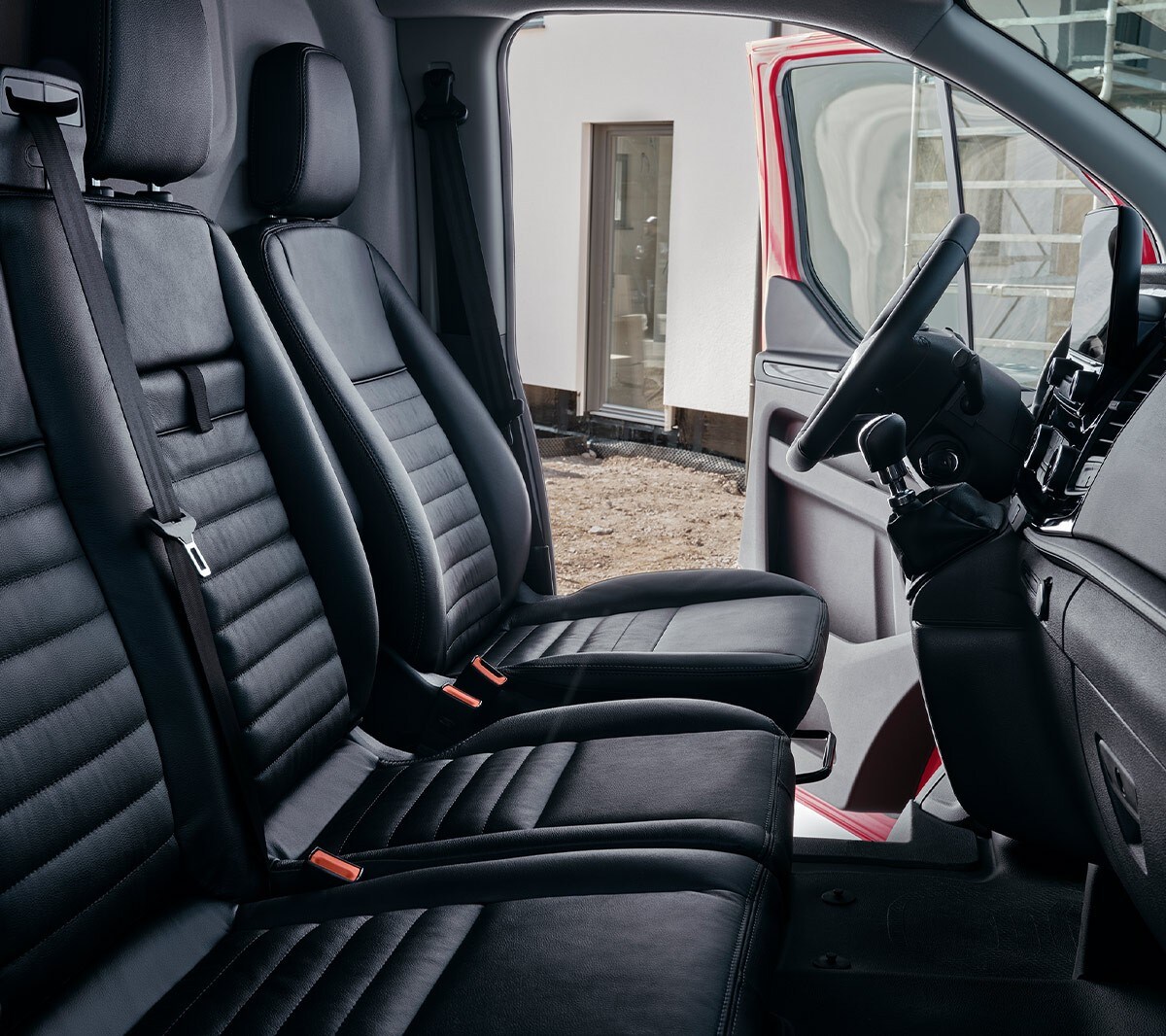 New Ford Transit Custom Trail interior with front seats, dashboard and steering wheel