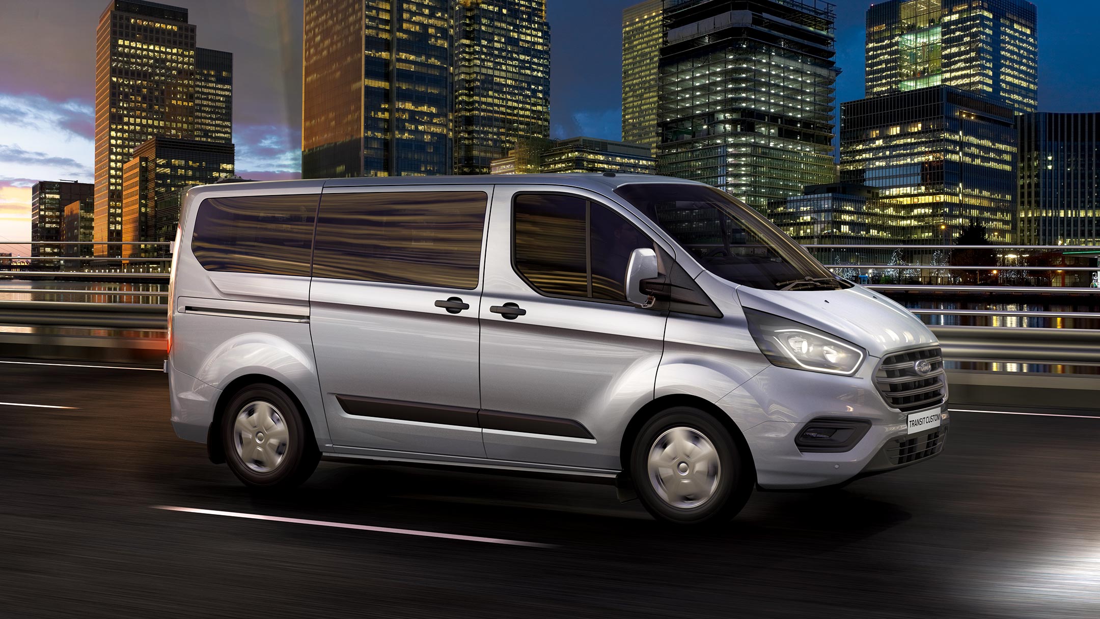 Ford Transit Custom driving in city at night