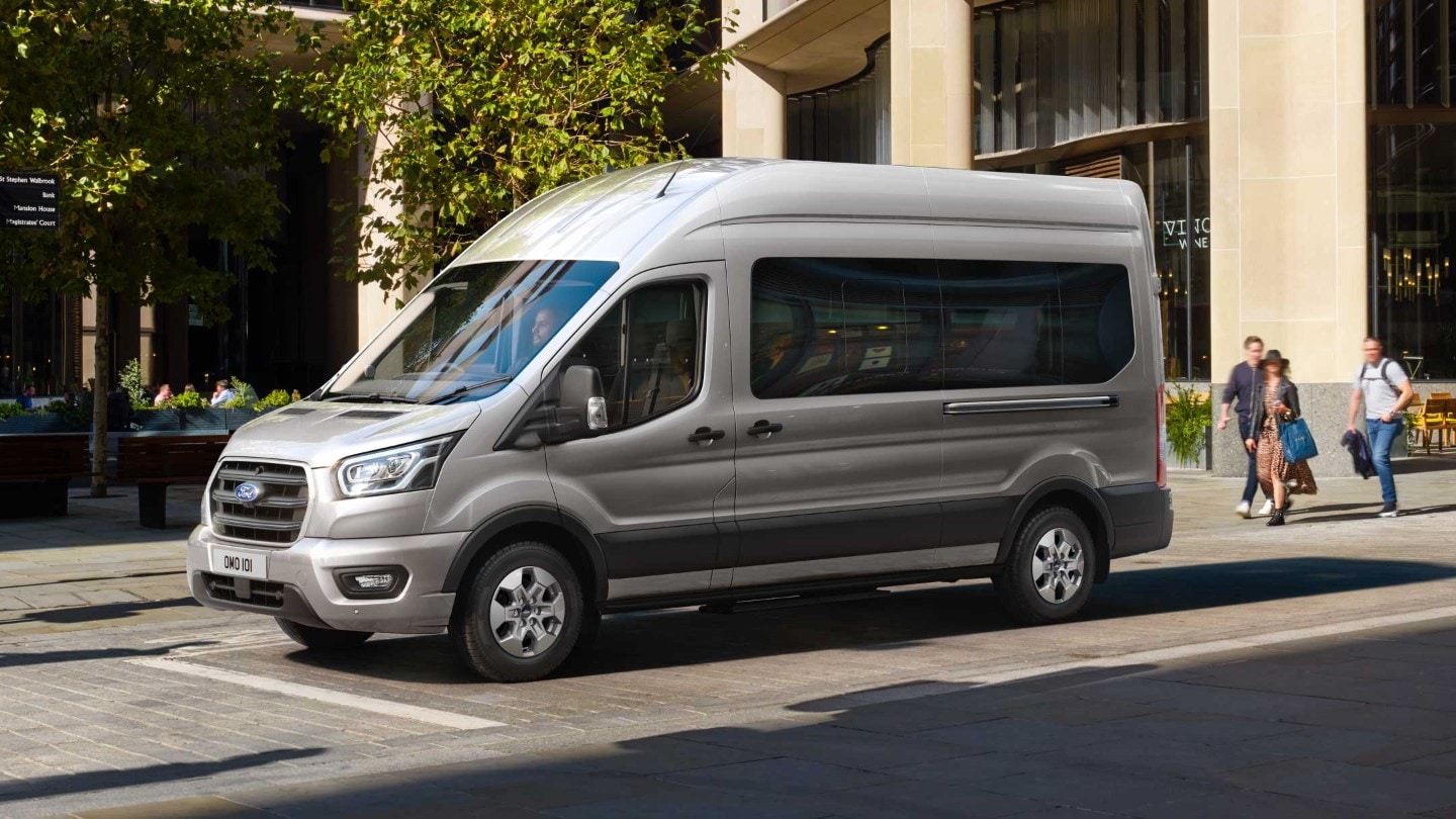 New Ford Transit Minibus standing on a busy street