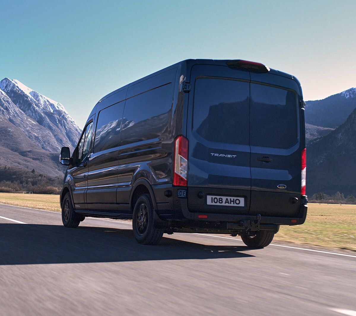 Blue Ford Transit Trail driving