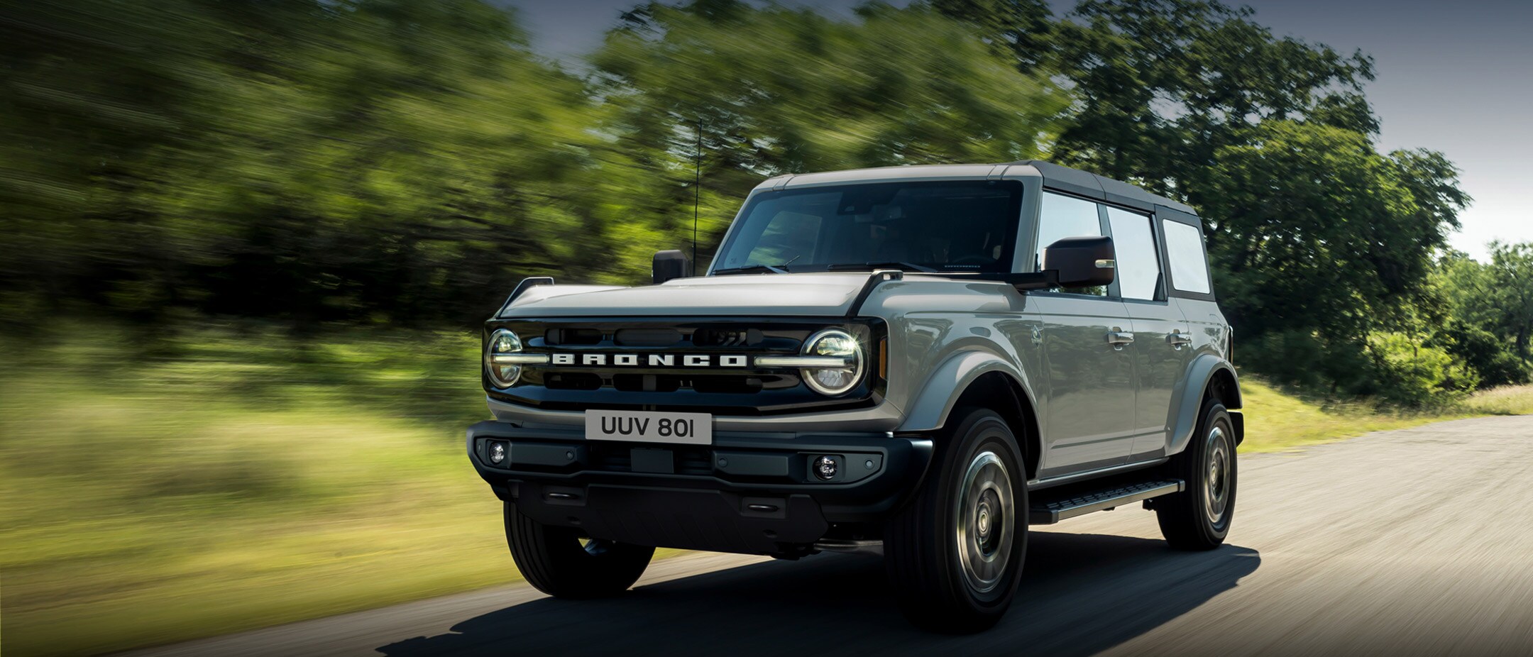 Ford Bronco driving on the road Ford Bronco driving on the road