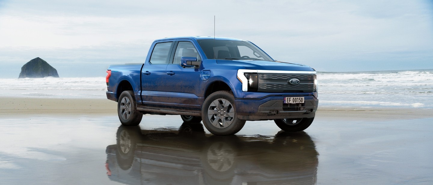 Ford F-150 Lightning parked on the beach