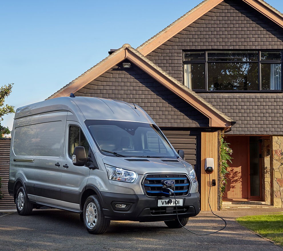 Transit infront of a house