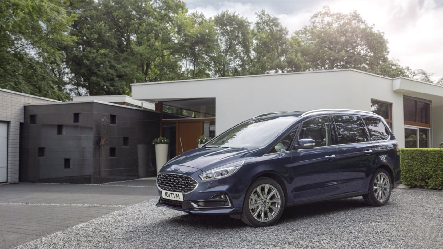 Ford car parked outside home