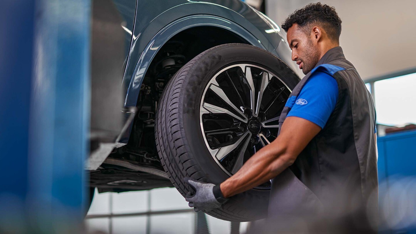A man changing a tyre